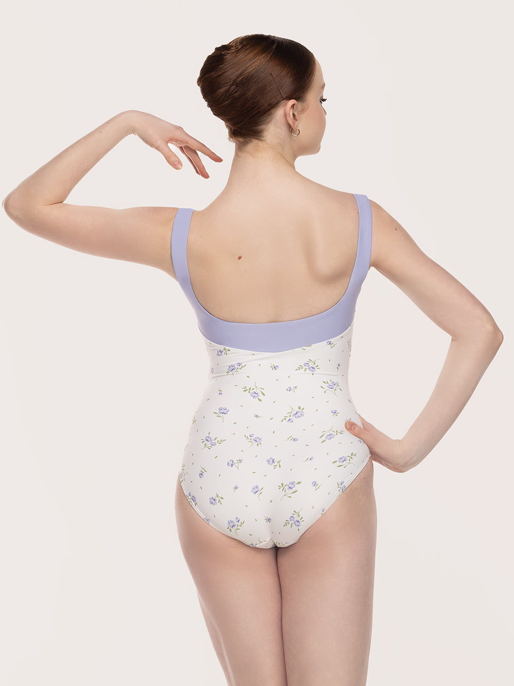 Eleve Dancewear Cindy Leotard in Baby's Breath print, back view of model posing.