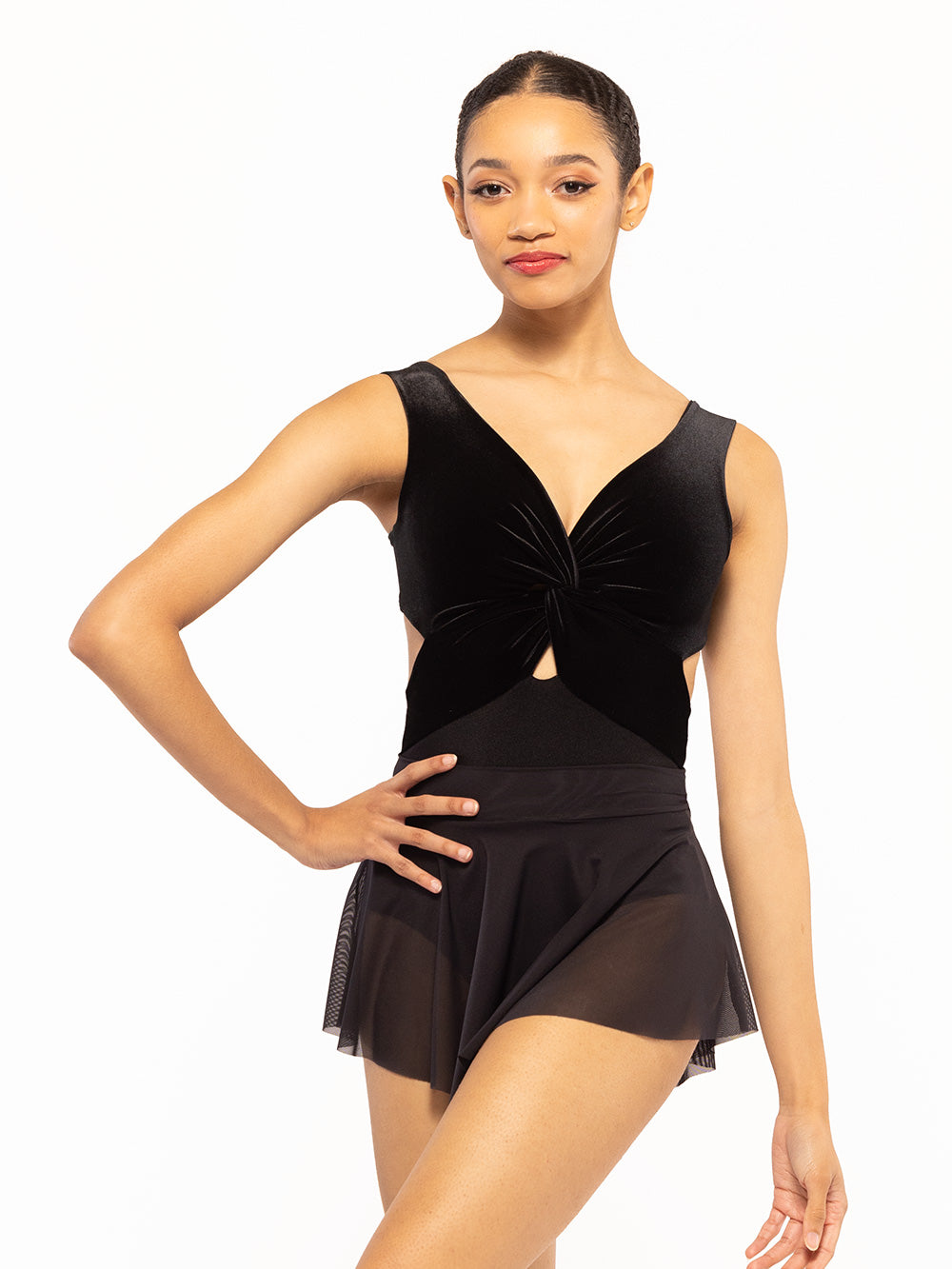 Dancer is facing front with one hand on the hip, wearing a Jackie Leotard Black Velvet RTW.