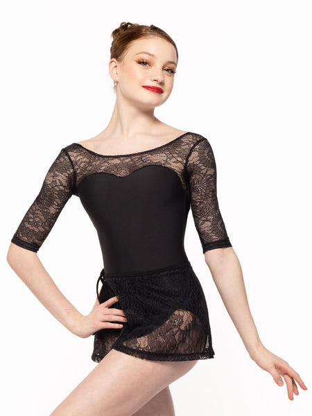 Dancer is facing front with one arm on the hip, wearing a Vinzant Leotard Black Zinnia Lace RTW