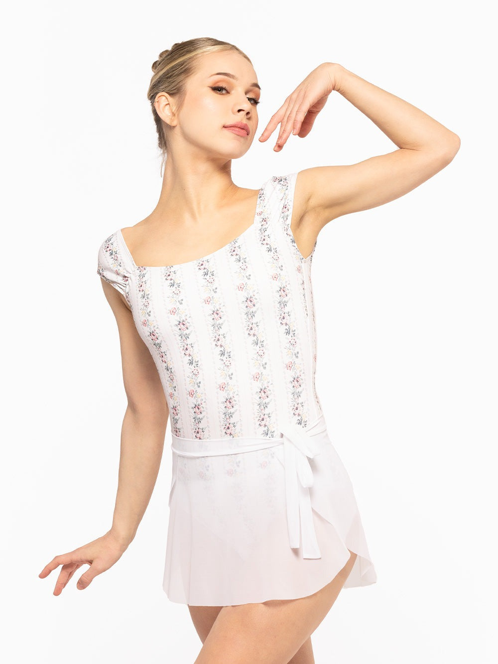 Dancer is facing front with one arm on the side to the shoulder, wearing a Angelina Leotard Delightful RTW.