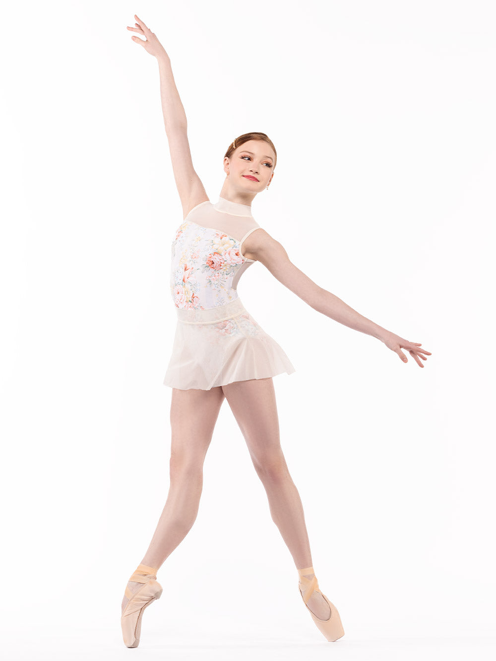 Dancer is posing in four position on point but in first arabesque angle with arms extended  in the same direction, wearing a Elizabeth Leotard Endless Love RTW.