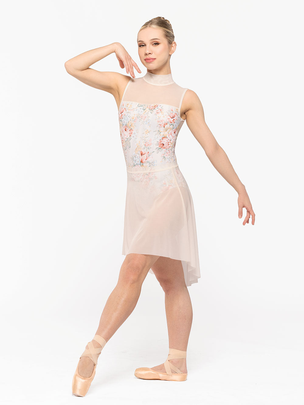 Dancer is facing front on tendu crossed devant with one arm on the shoulder, wearing a Elizabeth Leotard Endless Love RTW.