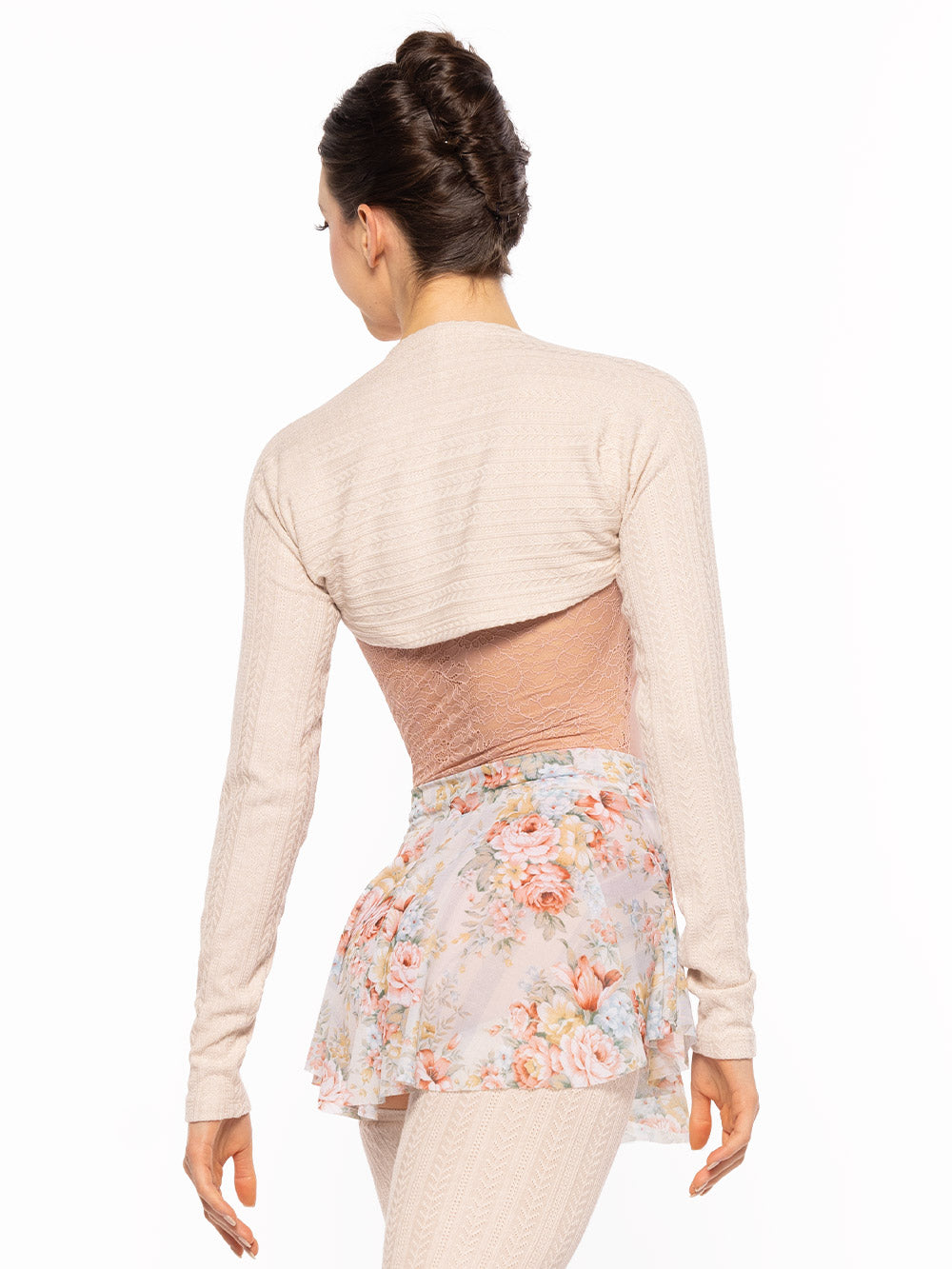 Dancer is facing back on tendu derreire, wearing a Hipster Skirt Endless Love Mesh RTW.