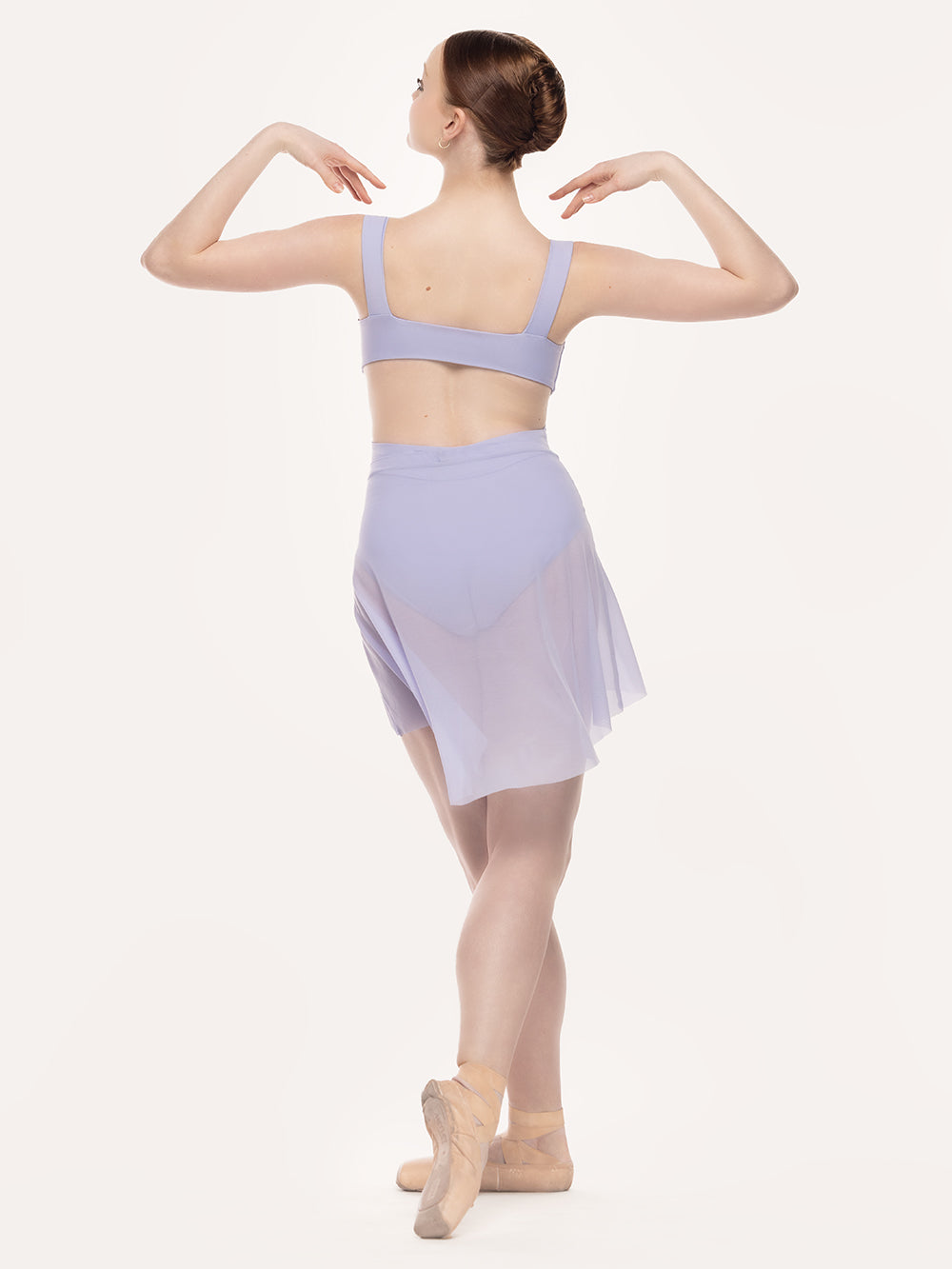 Eleve Dancewear Jackie Leotard in Lavender color, back view full body of dancer on cou-de-pie derriere.