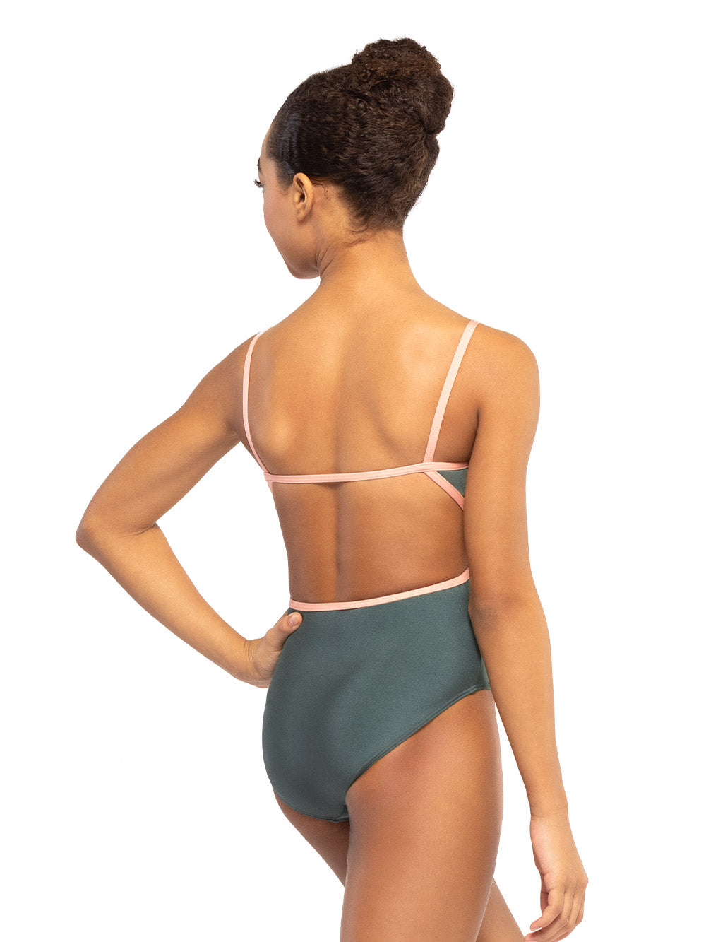 Dancer is facing back with one hand on the hip, wearing a Candy Leotard Plate Cacti RTW.