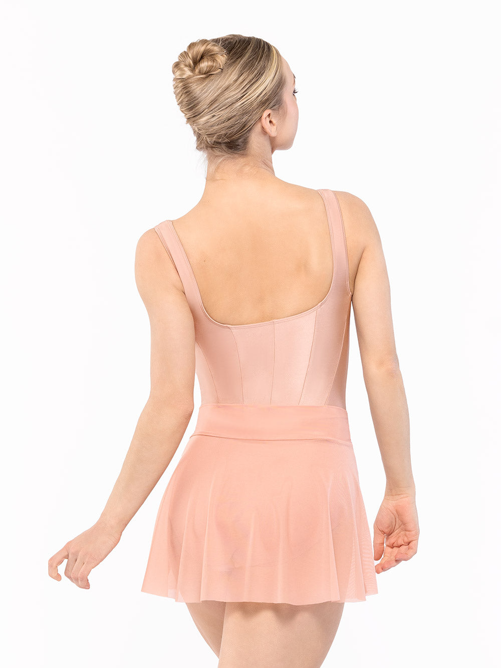 Dancer is facing back showing back detail of the Diana Leotard Rosewater RTW.