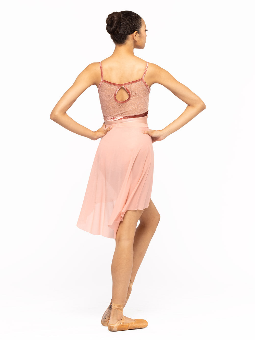 Back detail of the Ella Leotard Rosewater Lace Kids RTW while the dancer  face back.
