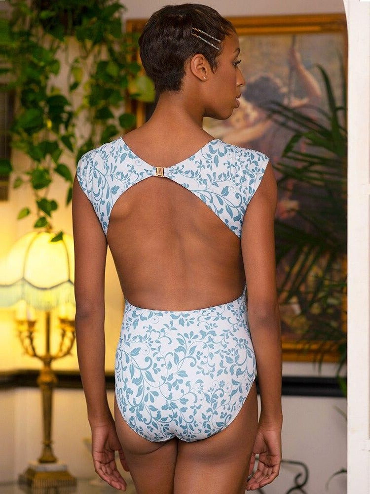 Model wearing blue ivy pattern leotard
