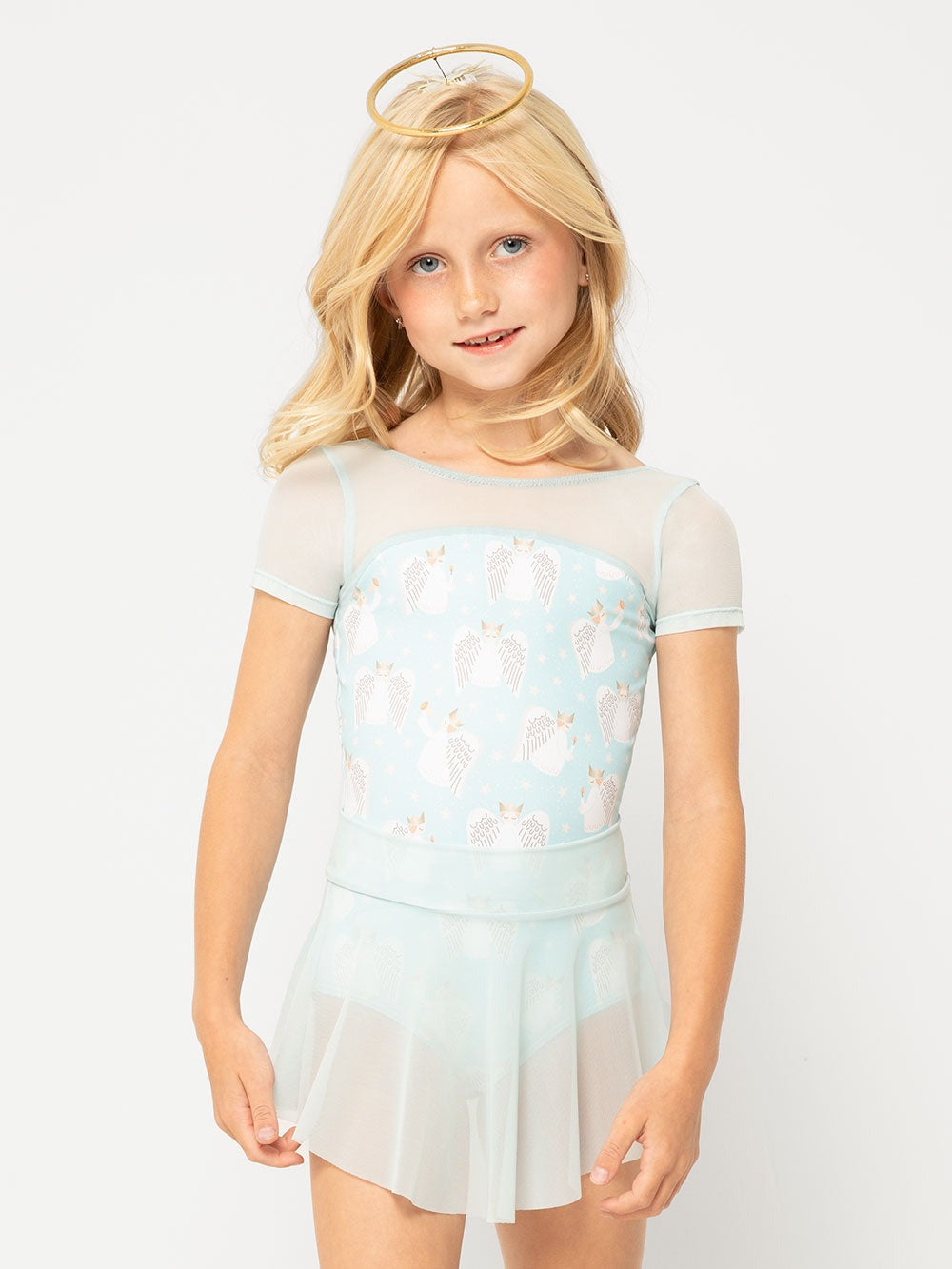 Model is in Angel print leotard with mesh shoulders and matching mesh skirt