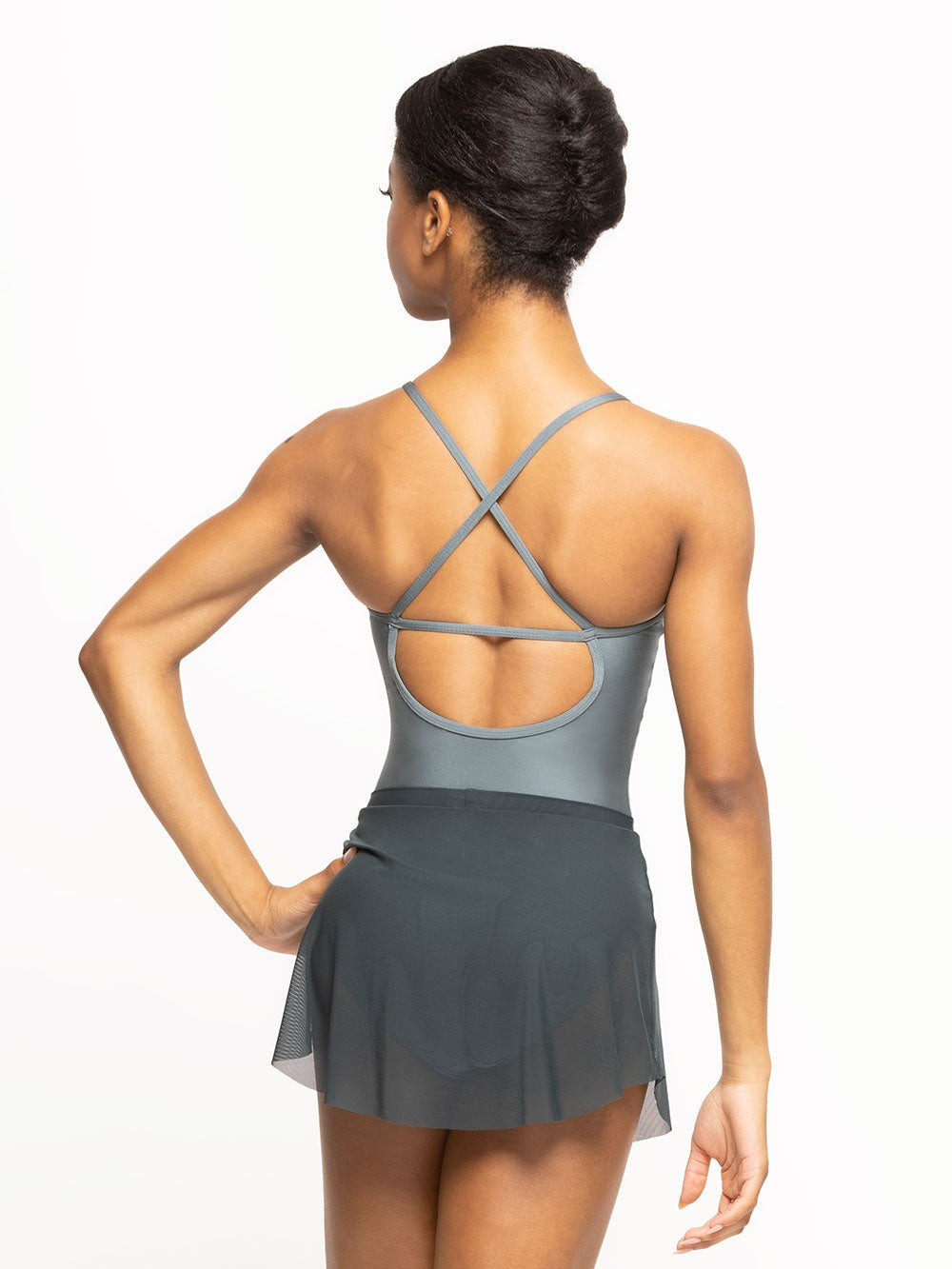 Back of Model is in Shiny blue Agave Leotard with dark blue skirt