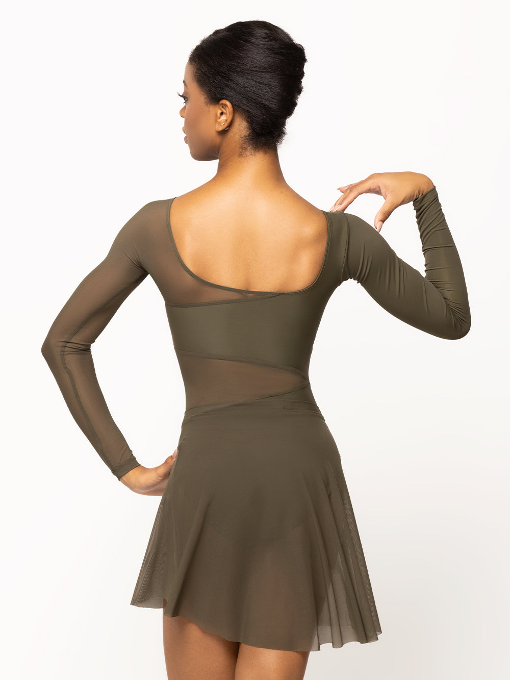 Back of model wearing a dark olive green leotard with long sleeves and dark green mesh detail on the waist, chest, back, and sleeve paired with a matching green mesh skirt