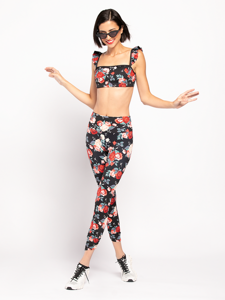 Model In Floral pattern athletic Crop top and matching tights