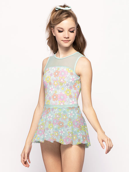 Model is in floral mesh skirt with matching leotard with floral pattern  mesh top front