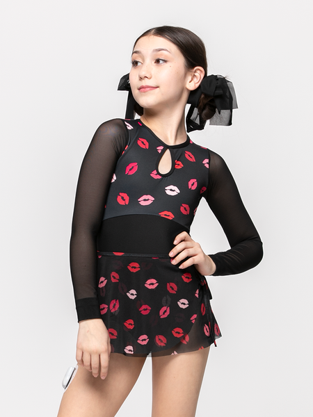 model showcasing black mesh skirt with kiss lips pattern