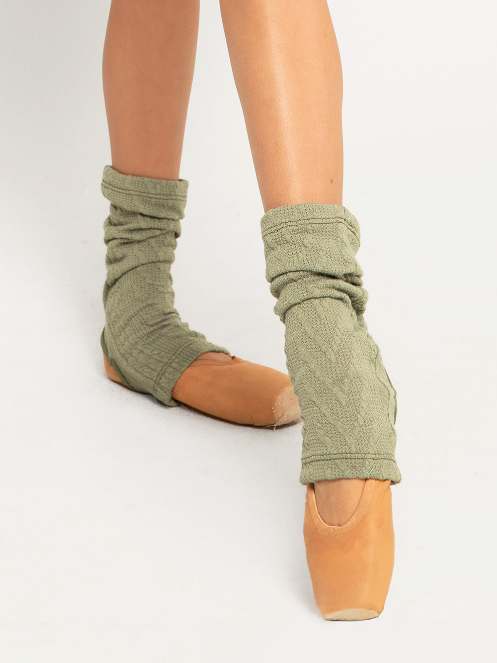 Model is in asage ankle warmers and Charcoal Knit shortie with sage shrug and red long leg warmers