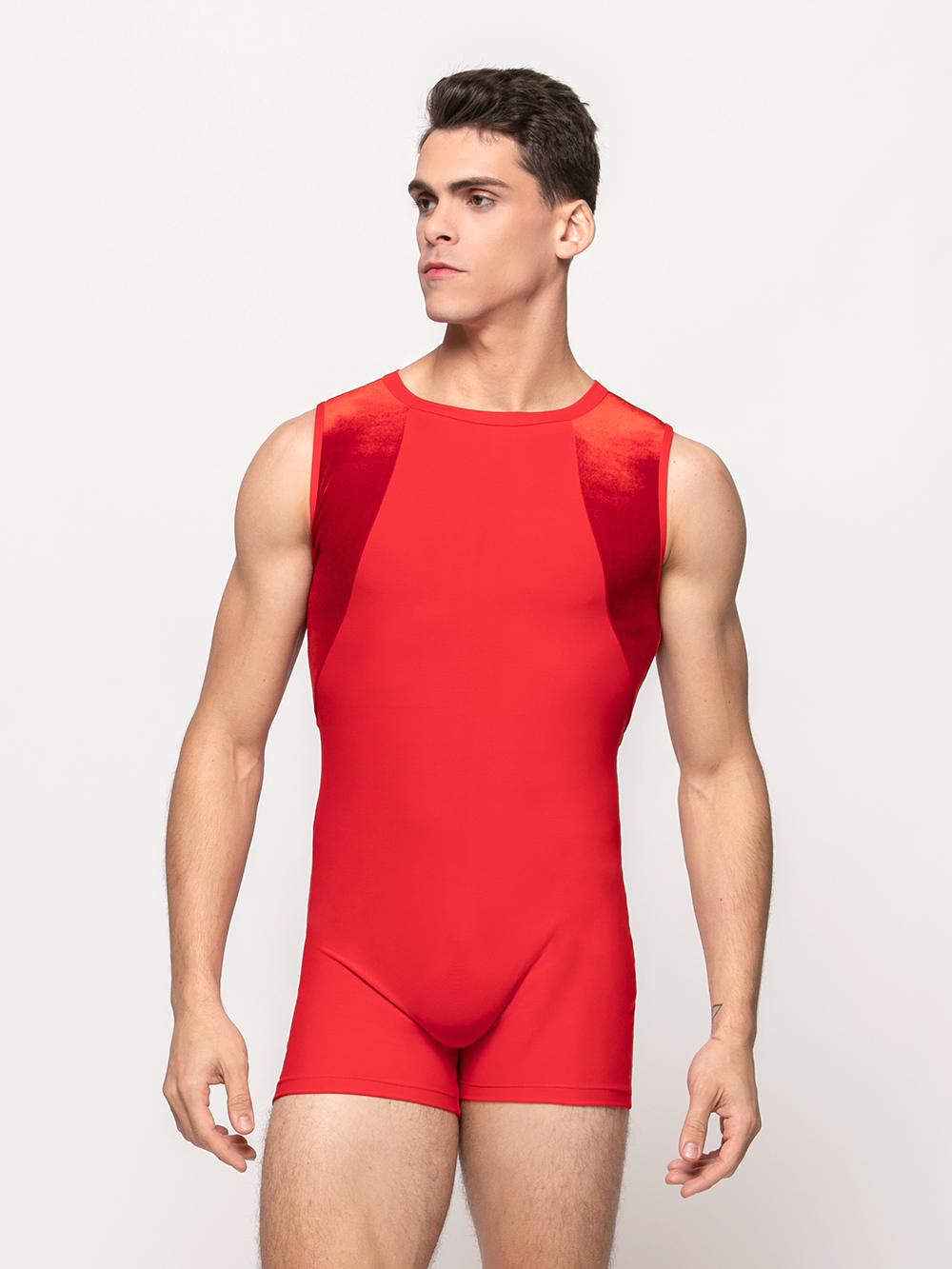 model in biketard with red base and red velvet shoulders