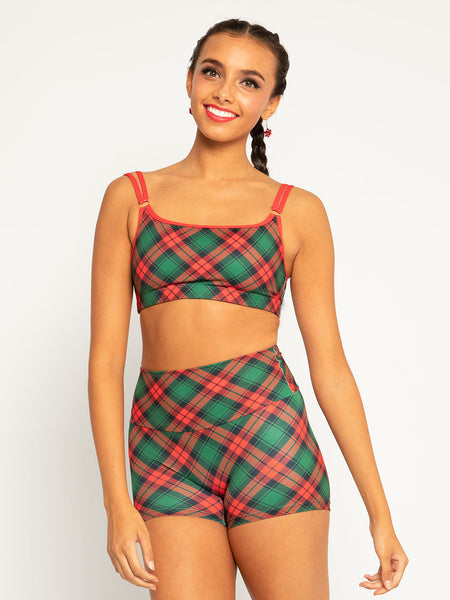 Model in holiday plaid crop top with matching shorts