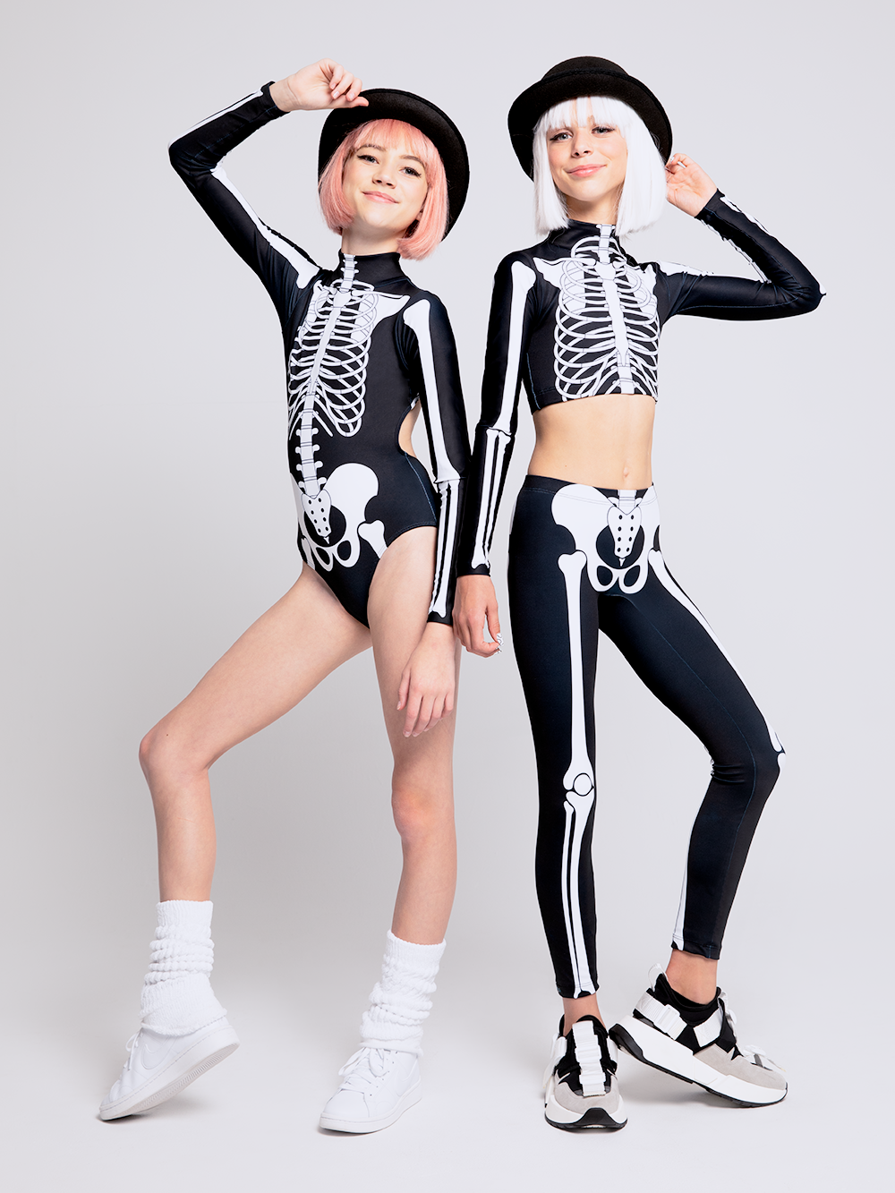 Two Models - one in X-ray skeletons leotard one in crop top and pants in X-ray skeleton print