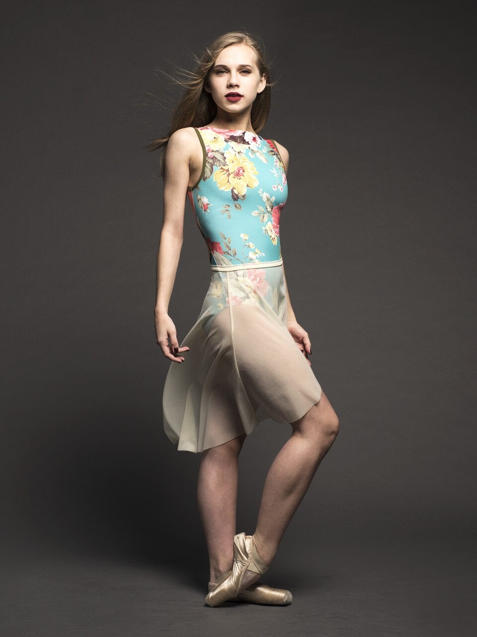 model showing side of ivory white mesh skirt