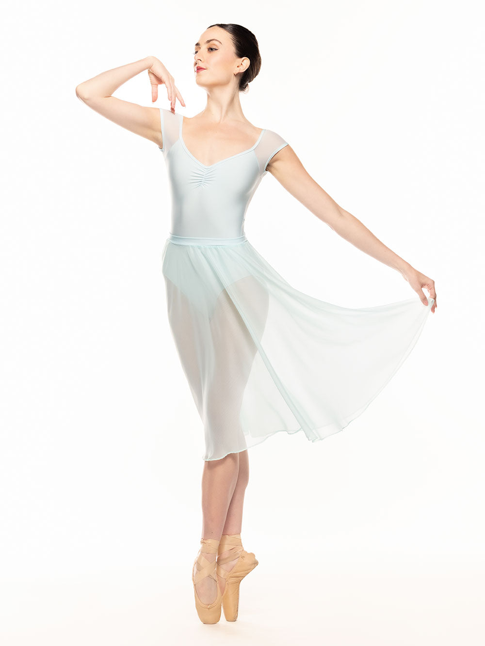 Eleve Dancewear Celine Leotard in Baby Blue print color, front view of dancer on fifth position on point