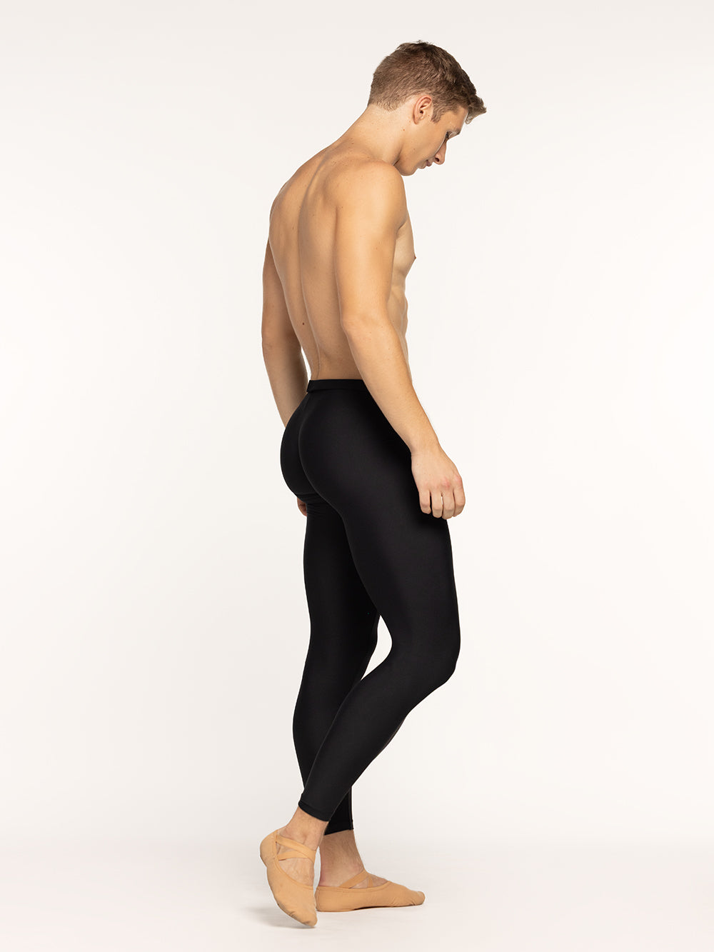 Eleve Dancewear Sean Tights in Soft Black, profile view.