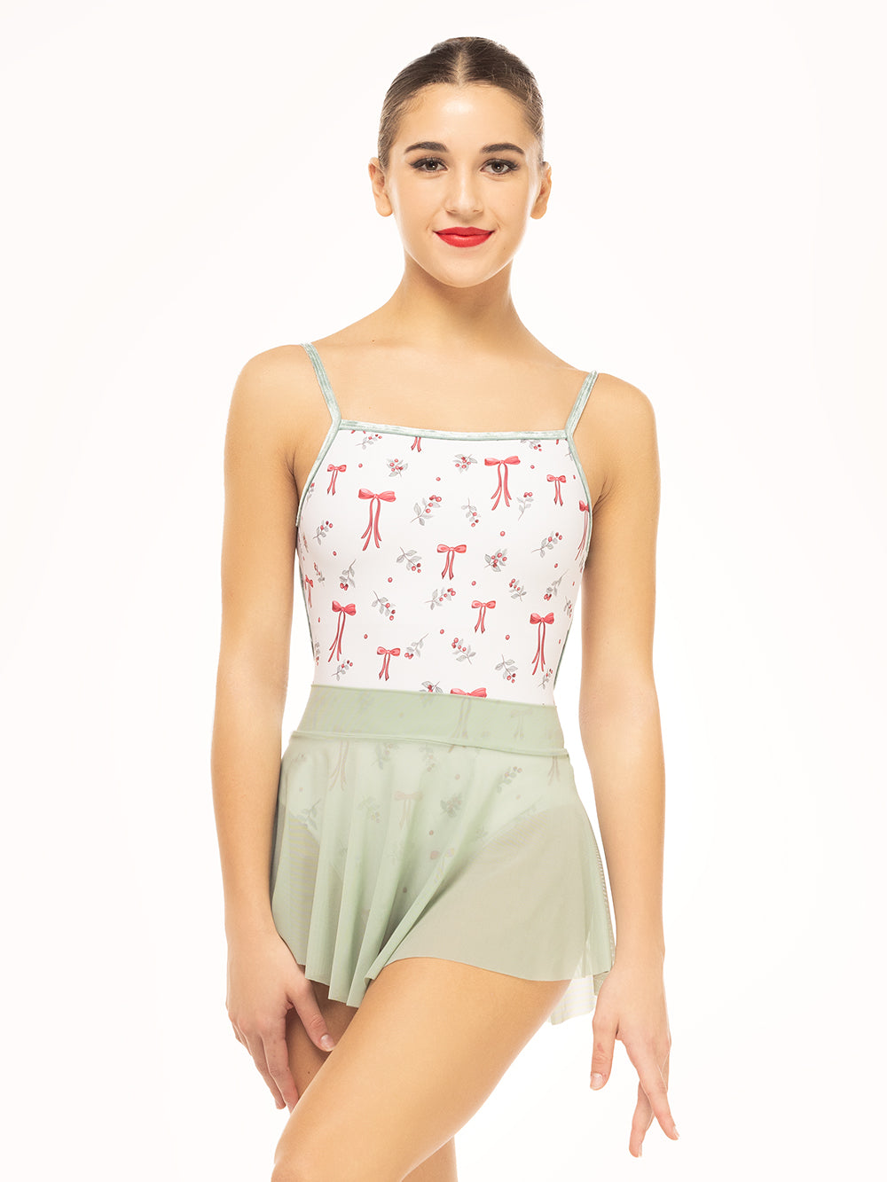 Eleve Dancewear Candy Leotard Kids in  Christmas Bows print color, front view of dancer posing.