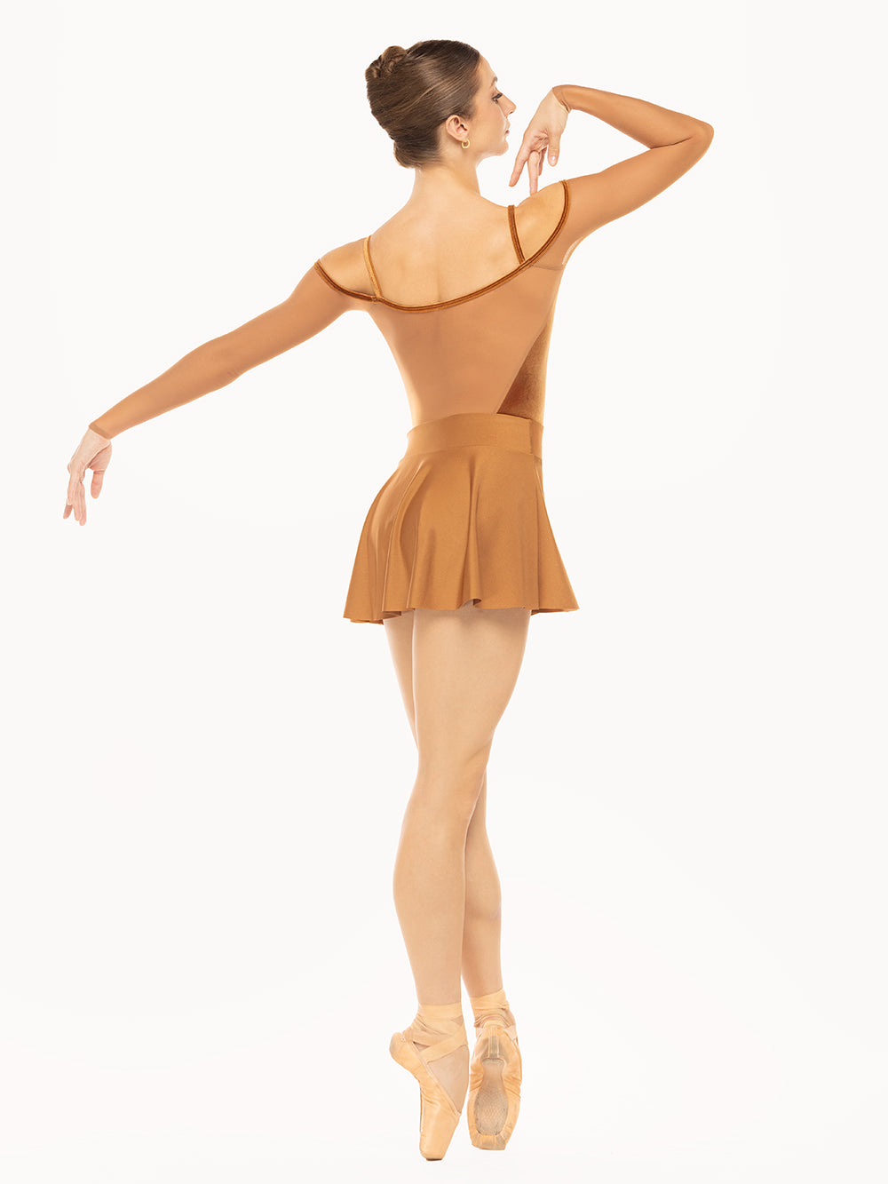Eleve Dancewear Amora Skirt in Cognac color print, back view of dancer posing on fifth position on point.