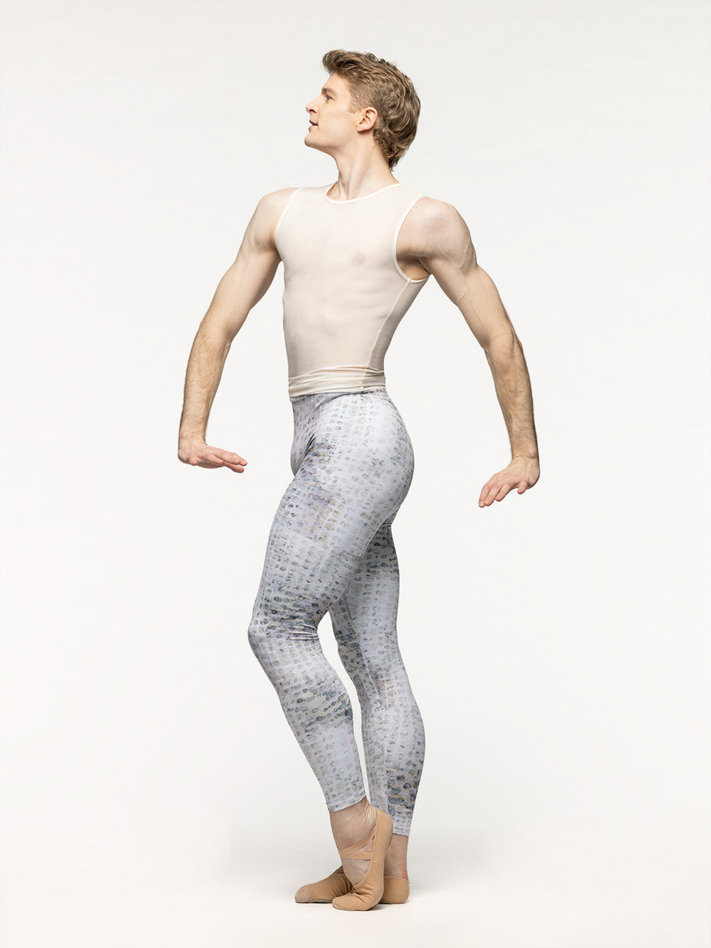 Eleve Dancewear Seth Shirt Kids in Cream Mesh print color, profile view of dancer posing
