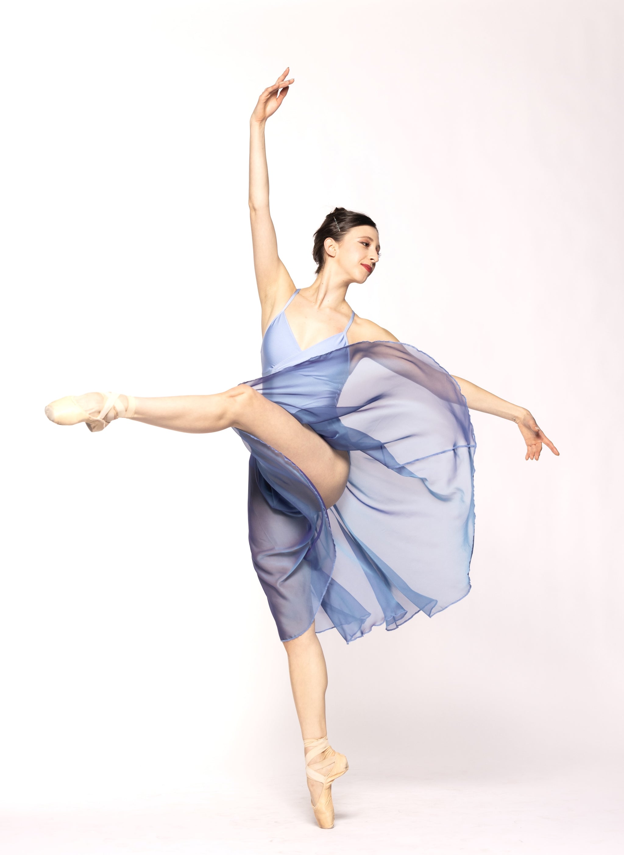 Eleve Dancewear Chiffon Rehearsal Skirt Kids in Hydrangea color, front view of dancer on pique attitude devant