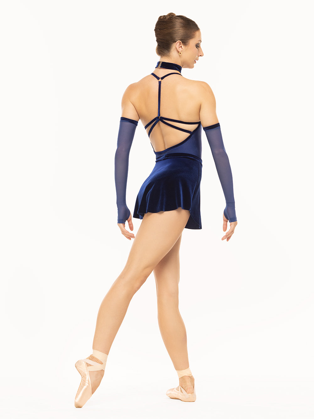 Eleve Dancewear Tulip Skirt Kids in Sapphire Velvet, back view of dancer posing on tendu derriere croisé.
