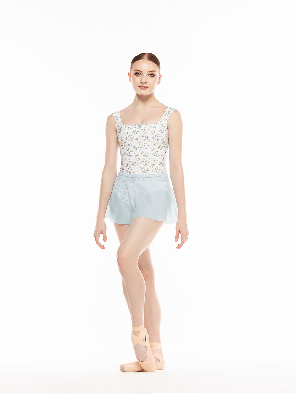 Eleve Dancewear Flare Skirt in Frost Mesh print color, front view of dancer posing