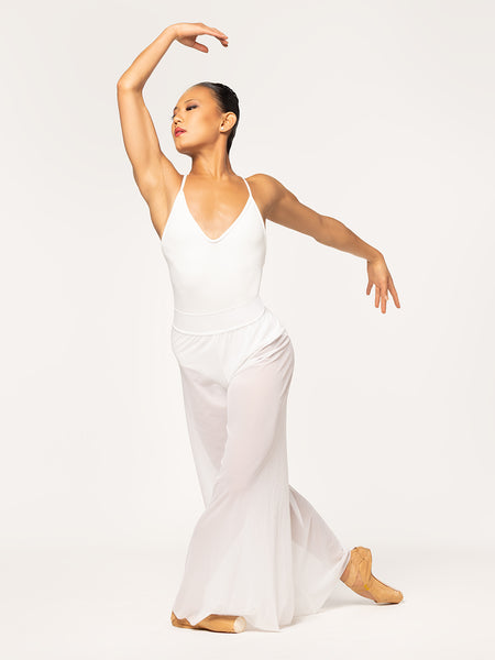 Eleve Dancewear Iris Leotard in Stage White color and A Line Pants in white mesh color with front view of model posing.
