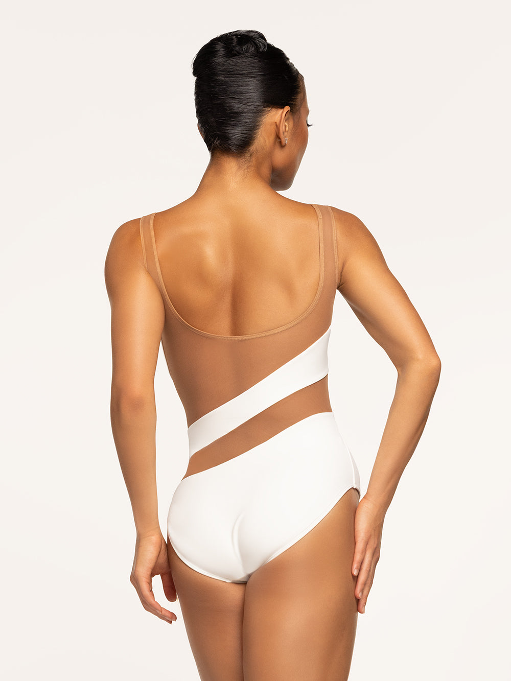 Eleve Dancewear Lunata Leotard Kids in Stage White Latte color with back view of model posing.