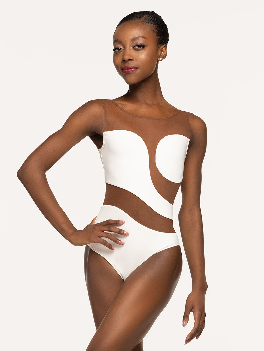 Eleve Dancewear Lunata Leotard Kids in Stage White Mocha color with front view of model posing.