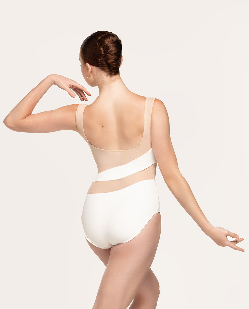 Eleve Dancewear Lunata Leotard Kids in Stage White Sand color with back view of model posing.