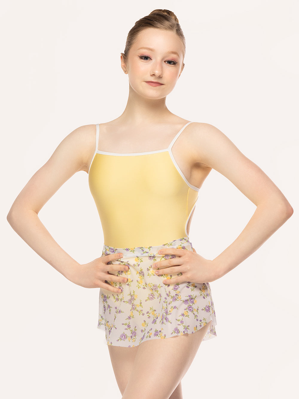 Eleve Dancewear Tulip Skirt in Violetta print, close front view of model posing.