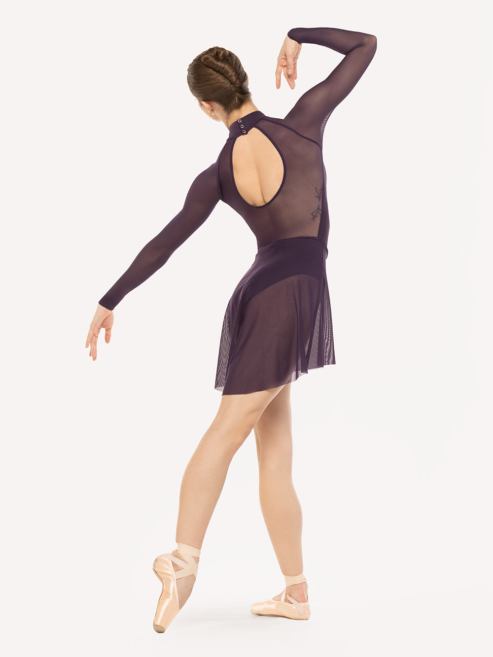 Eleve Dancewear Lynn Leotard Kids in Eggplant color, back view of dancer on tendu derriere croise