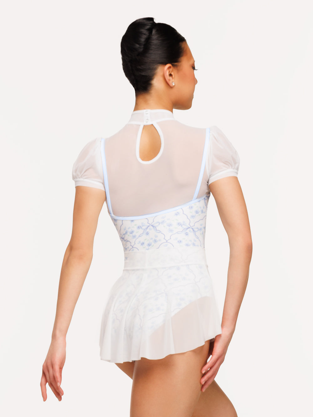 Eleve Dancewear Jillian Leotard in Final Bow print, back view of dancer posing
