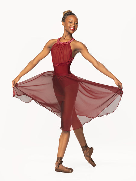 Eleve Dancewear Chiffon Rehearsal Skirt in Garnet print color, front view of dancer on tendu derriere croise