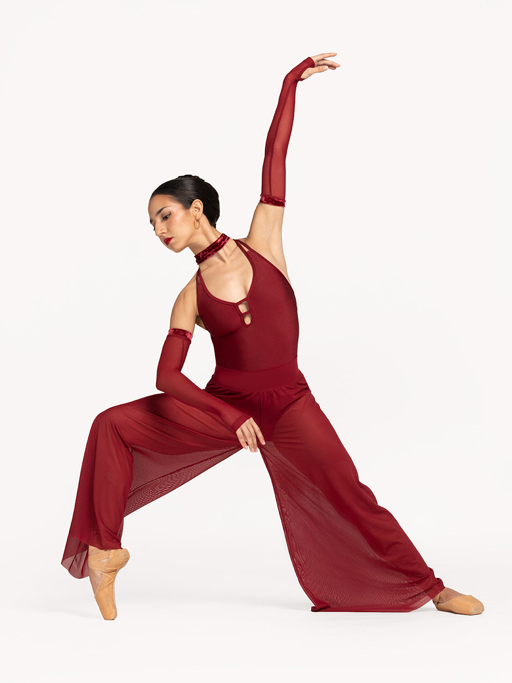 Eleve Dancewear Ilia Leotard Arm Sleeves and A-Line Pants in Garnet print color front view of dancer on a long four on devant point 