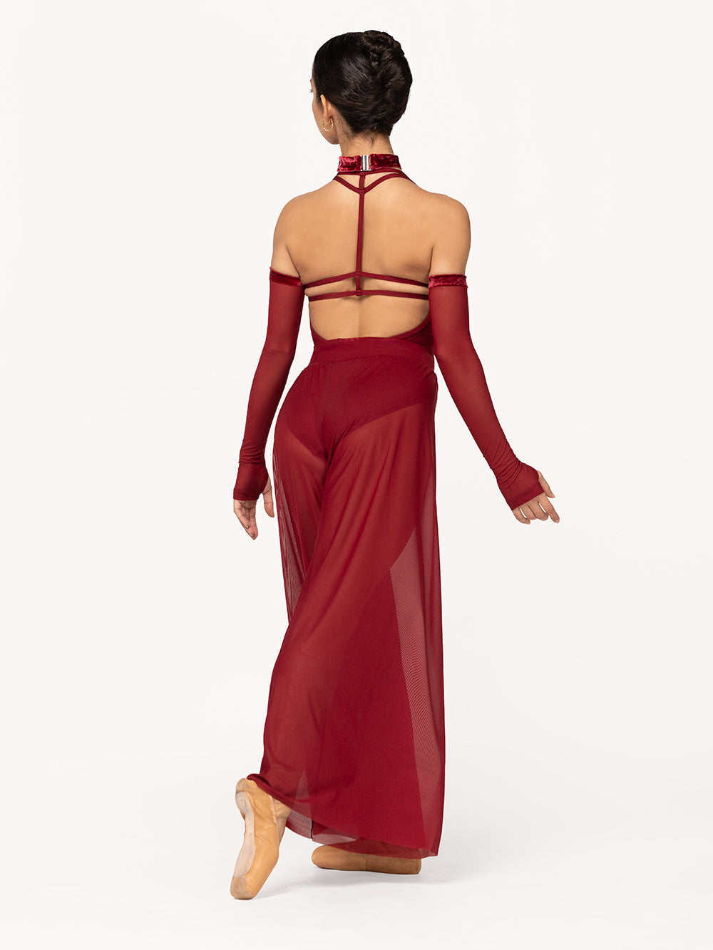 Eleve Dancewear A-Line Pants Kids in Garnet Mesh print color, back view of dancer on tendu derriere efface