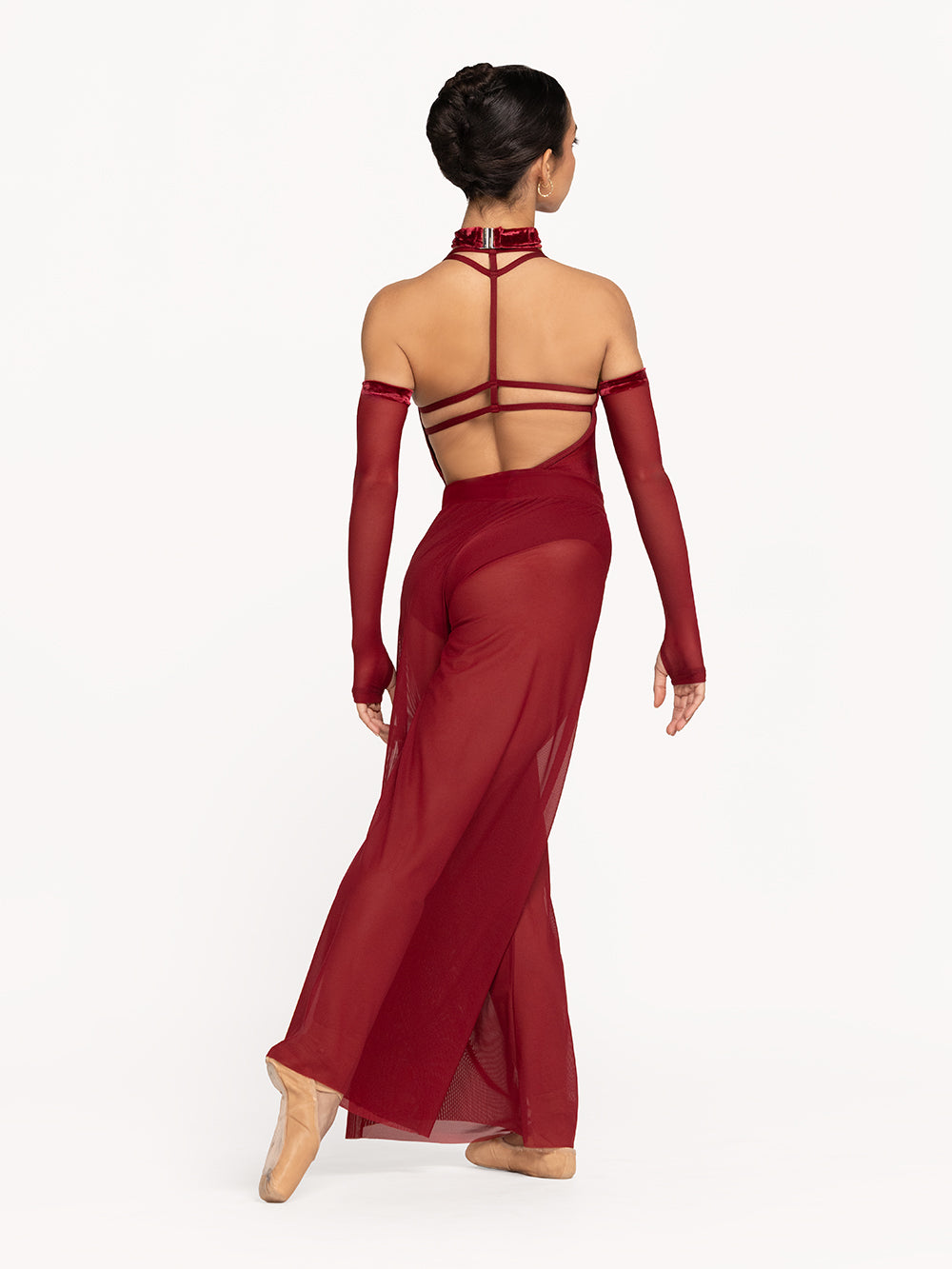 Eleve Dancewear A-Line Pants in Garnet Mesh print color, back view of dancer on tendu derriere efface