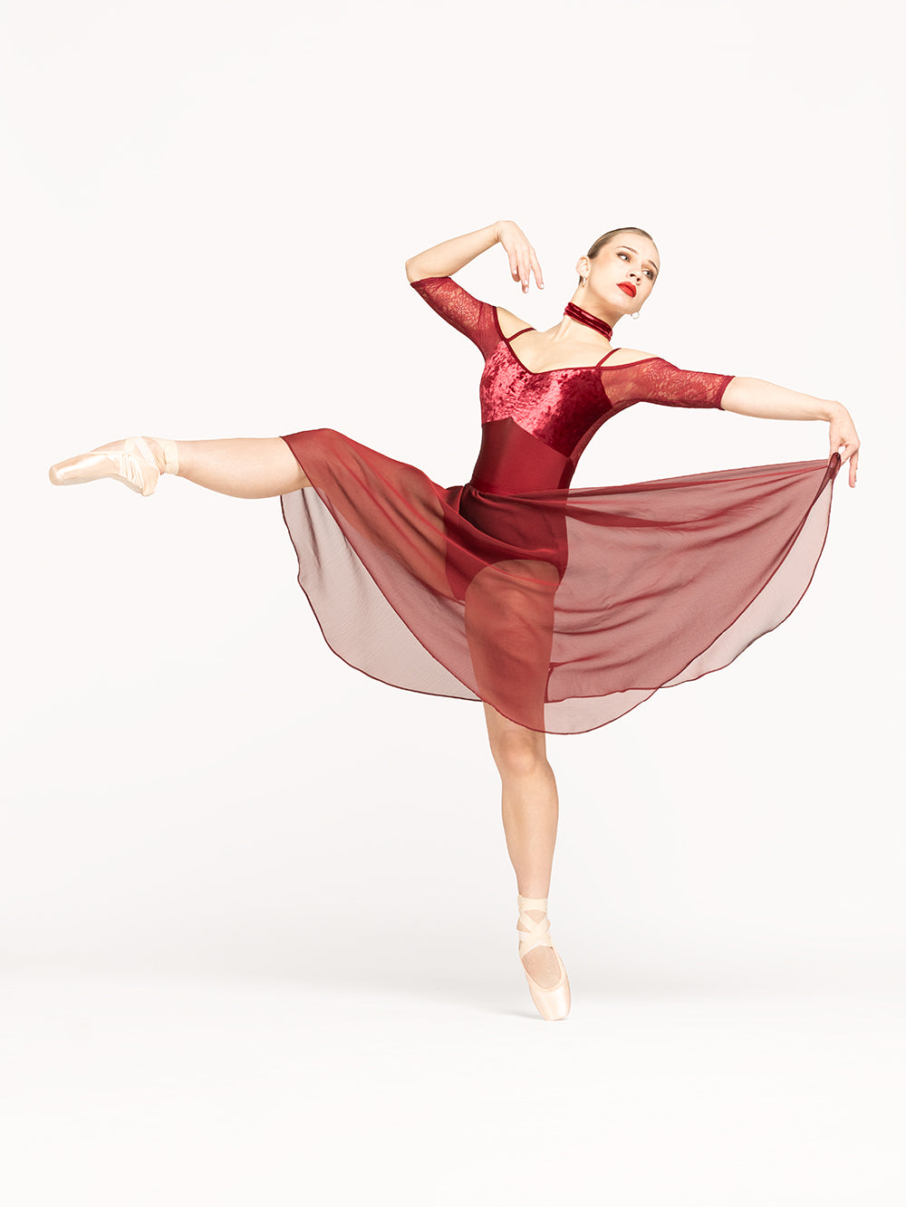 Eleve Dancewear Choker in Garnet Crushed Velvet print color, front view of dancer on pique attitude efface