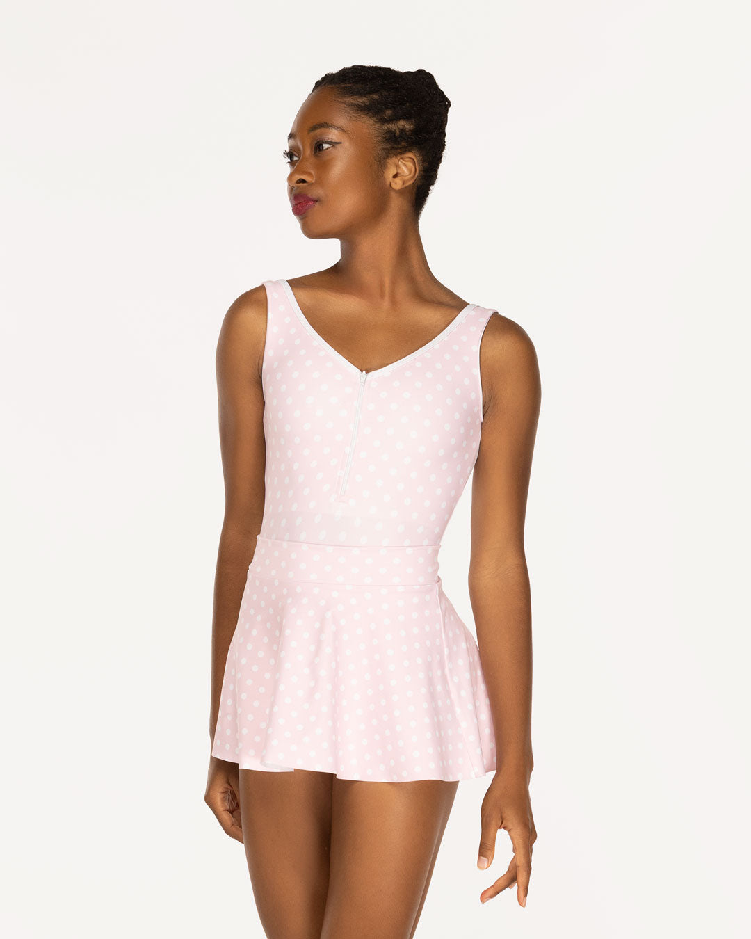 Eleve Dancewear Chelsea Leotard and Flare Skirt Kids in Light Pink Polka Dot color print, front detail view of dancer posing