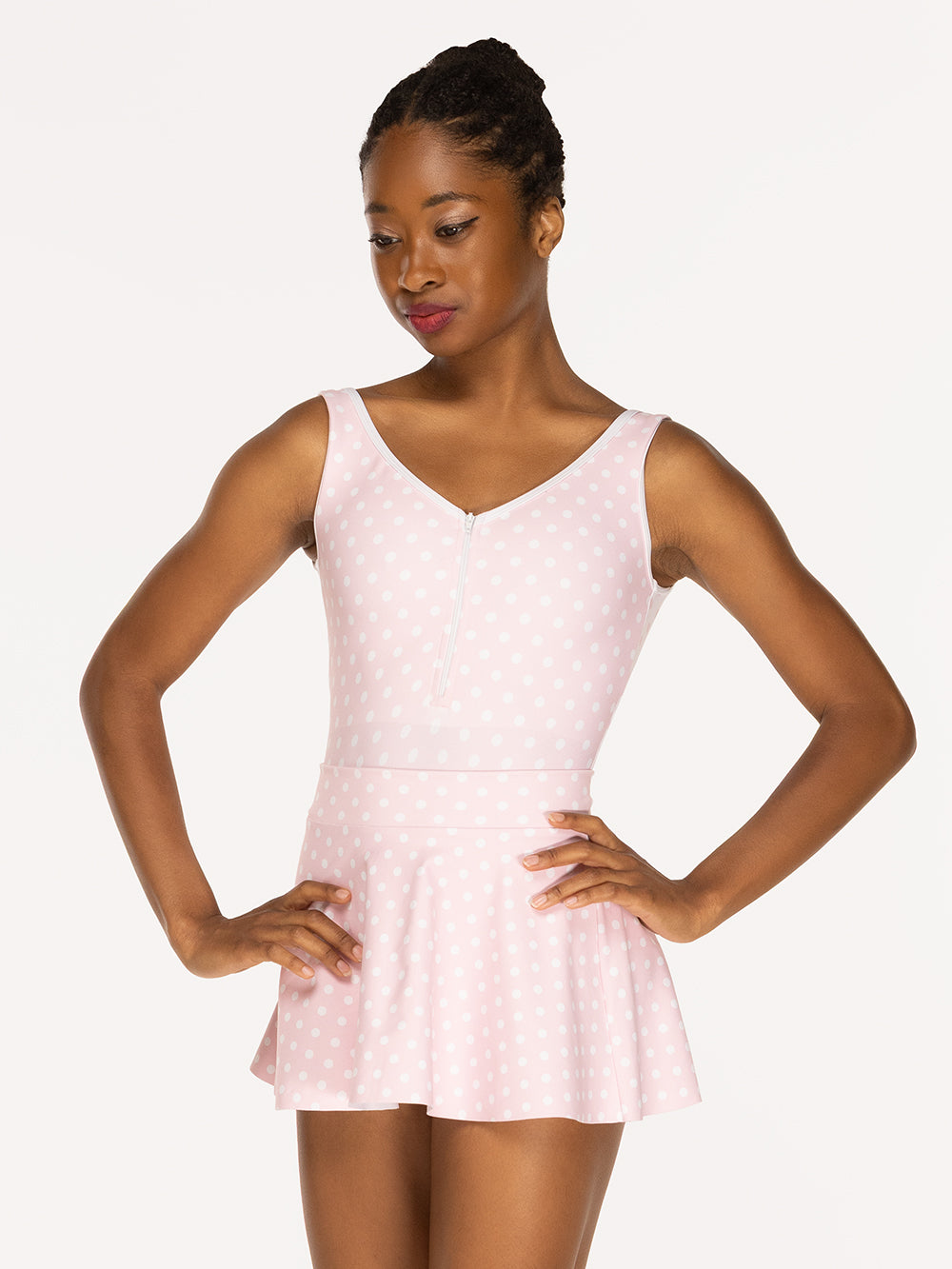 Eleve Dancewear Flare Skirt in Light Pink Polka Dot color print front view of dancer posing