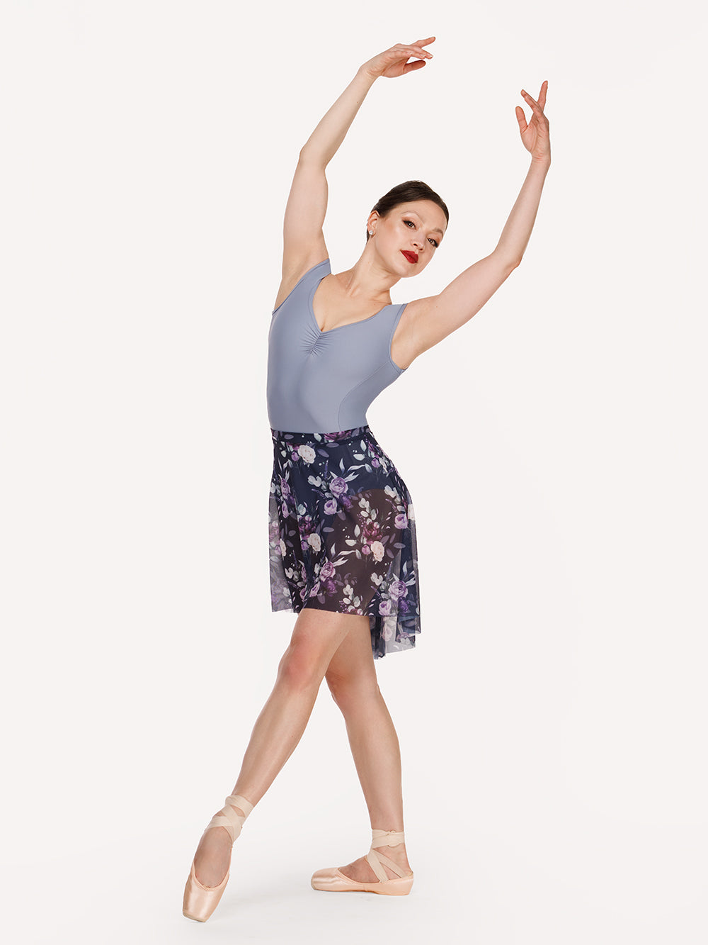 Eleve Dancewear Heather Leotard in Light Wisteria color, front view of dancer on tendu devant croise and fifth arms