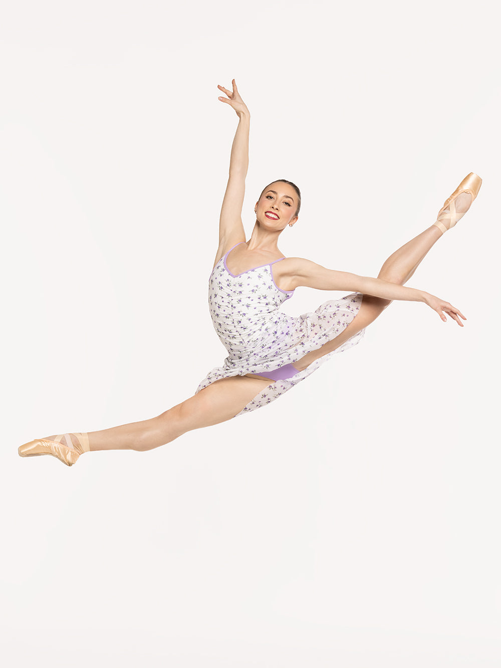 Eleve Dancewear Frieda Leotard Kids in Pathway and Whisper print color, front view of dancer on sissonne efface
