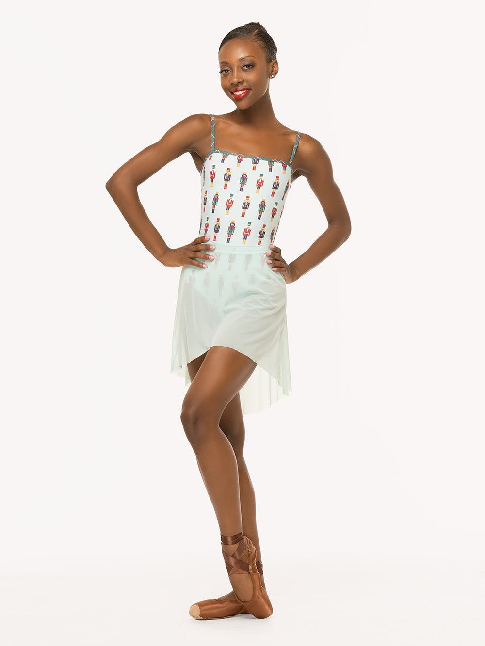 Eleve Dancewear Helena Leotard Kids in More Nuts print, detail front view of dancer posing