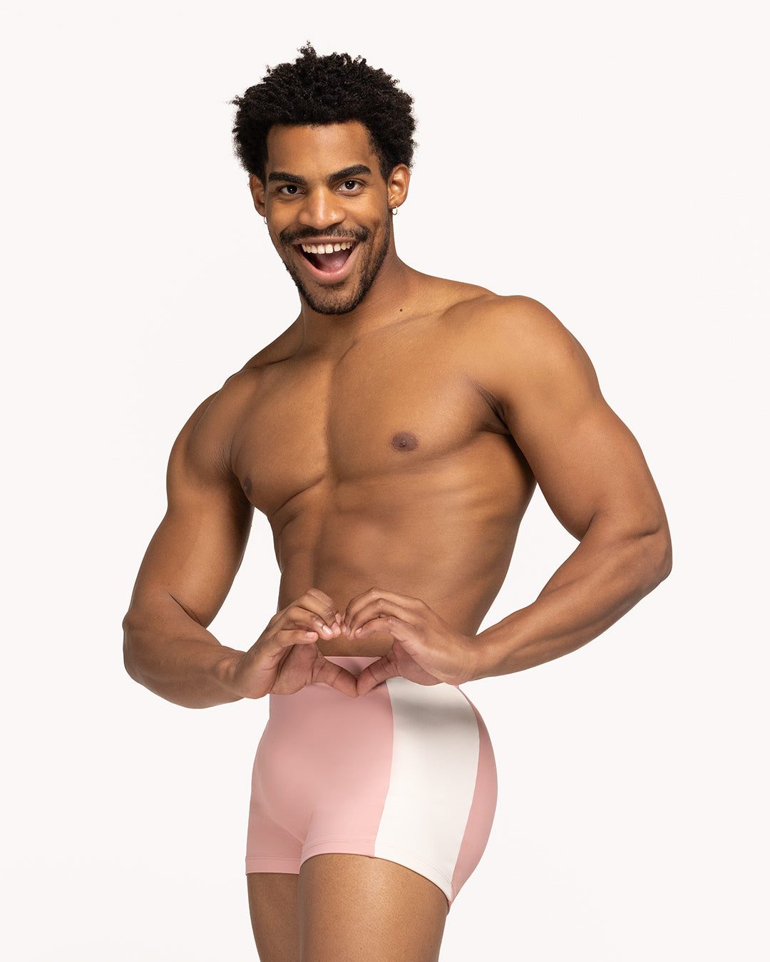 Eleve Dancewear Juan Shorts in Rose color, front view of dancer posing