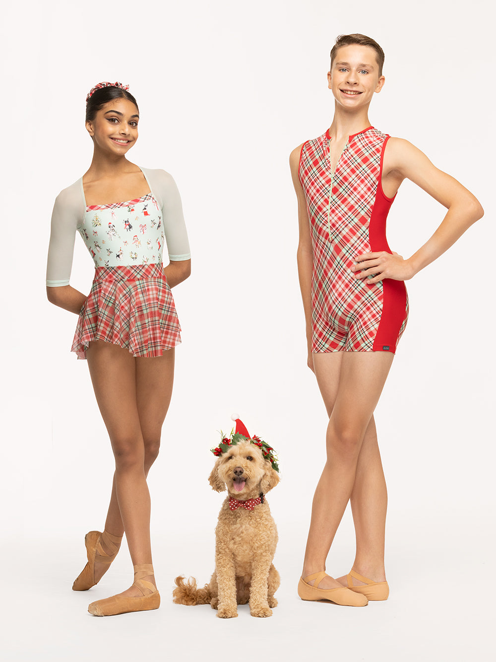 Eleve Dancewear Chris Leotard Christmas in Dogs Spearmint print, front view of two dancers with a cute doggy